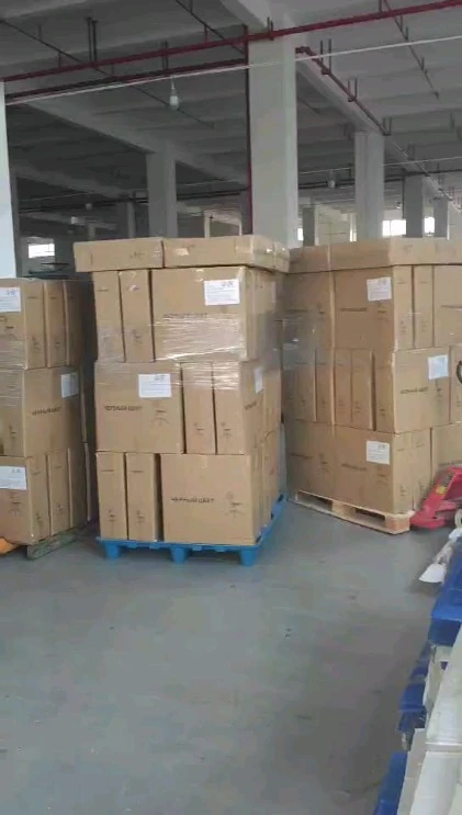 Cartons stacked on pallets inside a warehouse